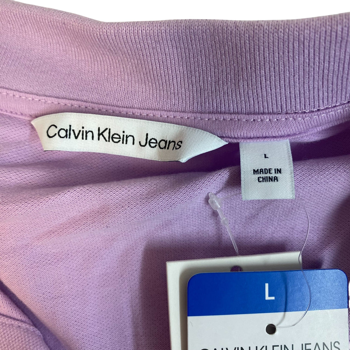 Calvin Klein Women's V-Neck Polo Tee SIZE - Large